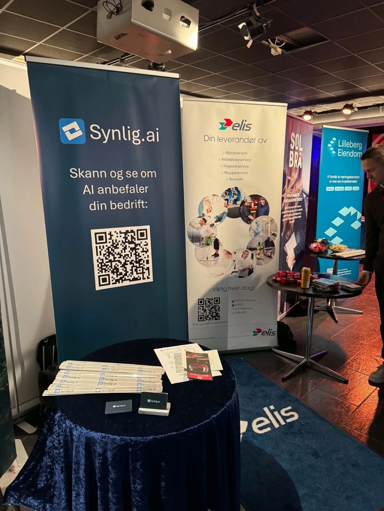 Our stand: Roll-up with a QR code where participants could scan and see whether AI recommends their business